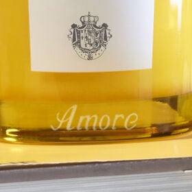 A bottle engraving candle